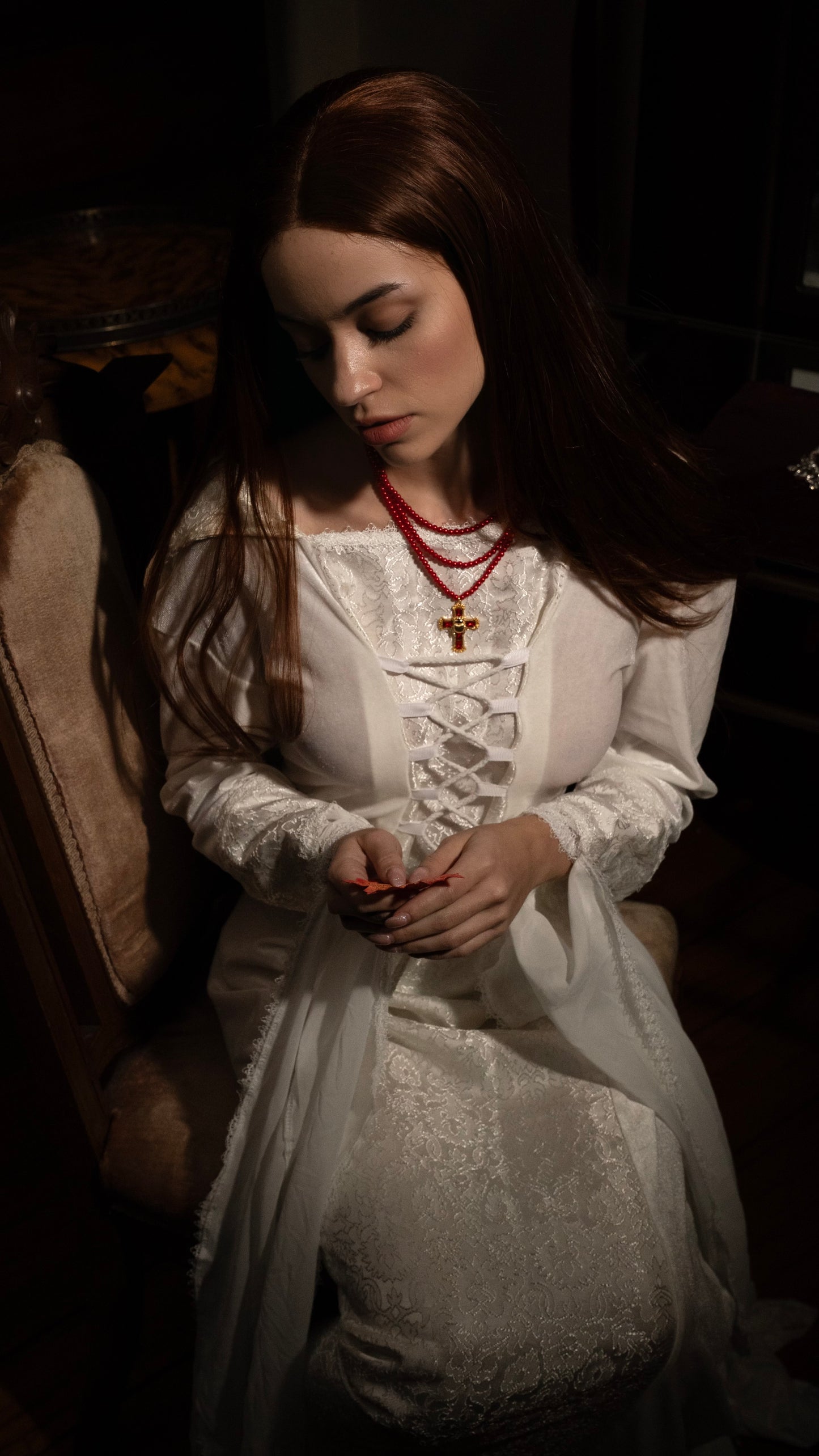 Elizabeth’s three layer red beaded scarab cross necklace