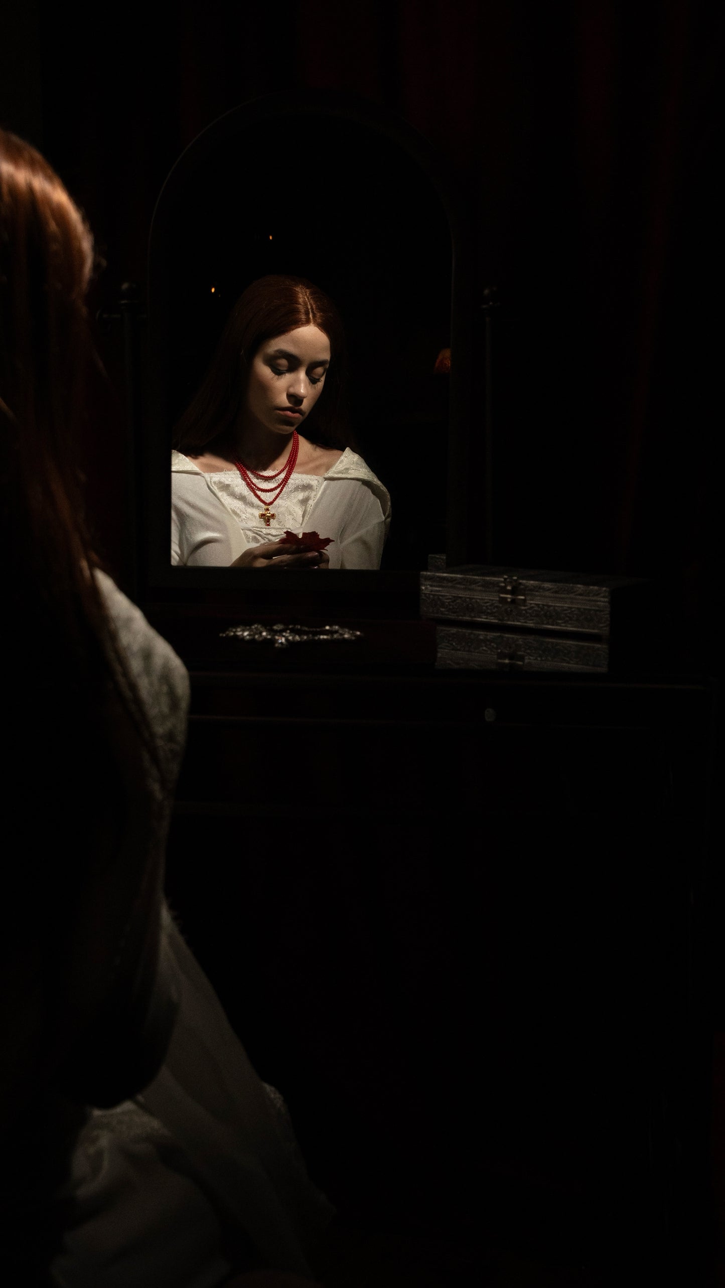 Elizabeth’s three layer red beaded scarab cross necklace